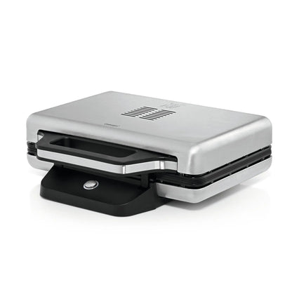 WMF Lono Sandwich Maker in stainless steel with a sleek black handle and LED indicators.